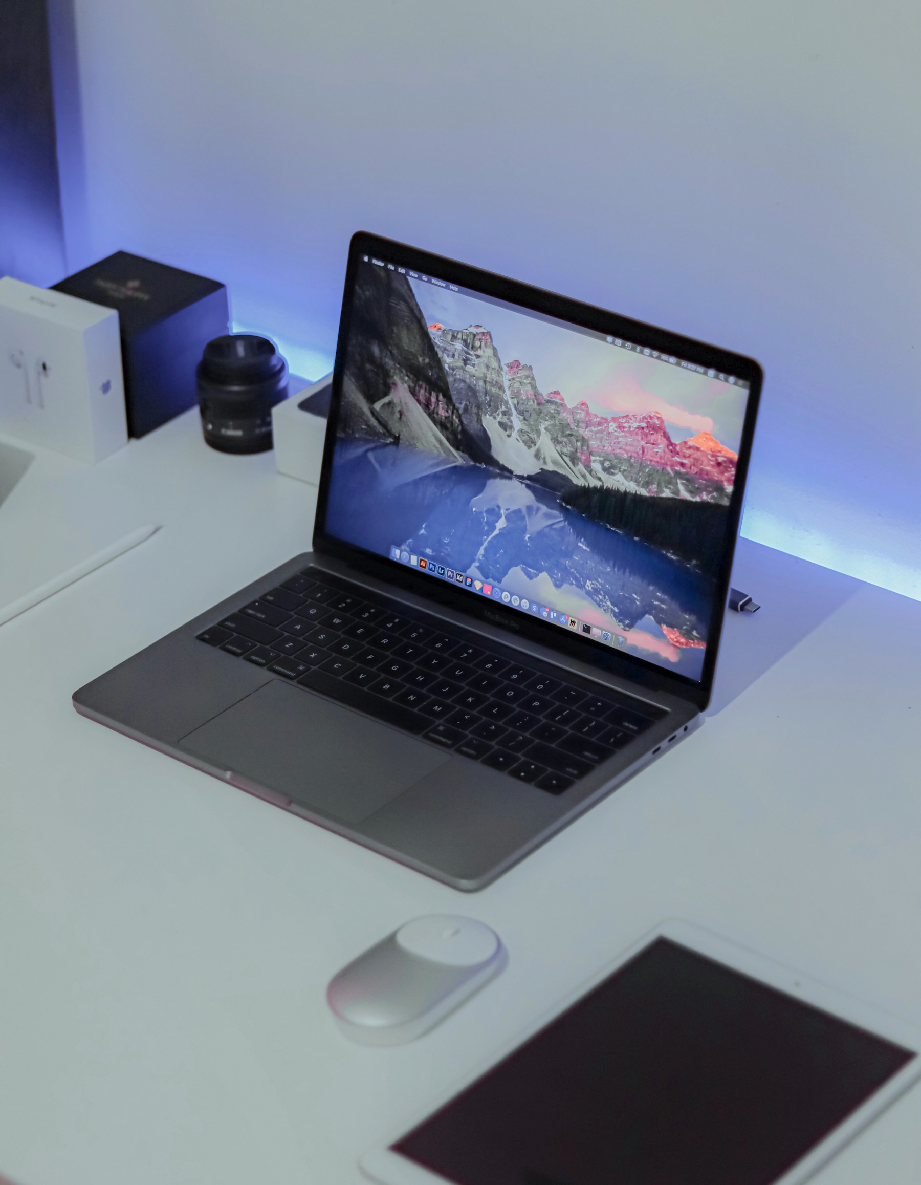 Laptop workspace supporting refurbished MacBook research and comparison